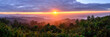 Panoramic view of sunrise with mist and mountain at Doi Pha Hom Pok  in Chiang Mai, Thailand.