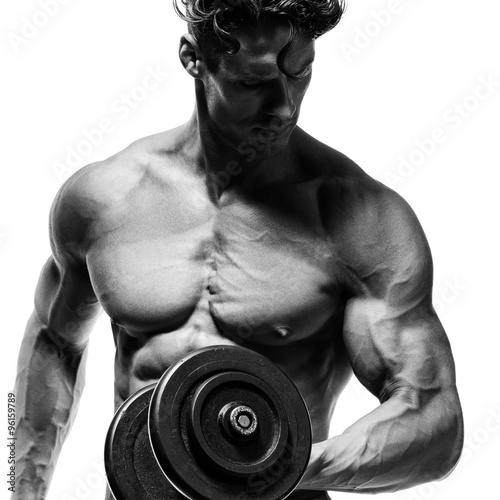 Fototapeta do kuchni Muscular bodybuilder guy doing exercises with dumbbells