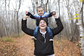 mother with his boy in the forest