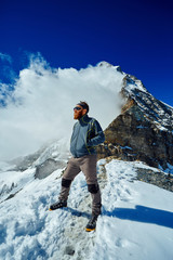 Wall Mural - hiker at the top of a pass