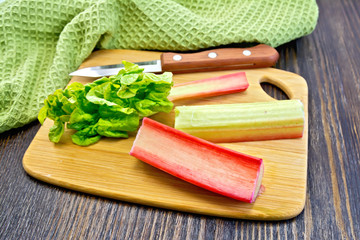 Poster - Rhubarb with knife and napkin on board