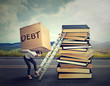 © pathdoc - Student loan debt concept. Woman with heavy box debt carrying it up education ladder