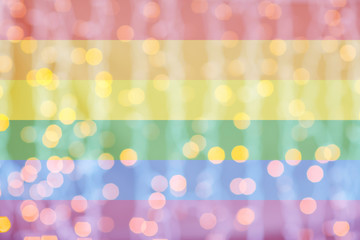 Wall Mural - blurred golden lights over rainbow flag background