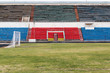 Field and tribunes of abandoned  stadium 