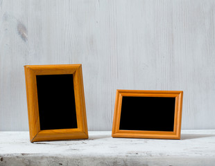 Canvas Print - photo frames on table