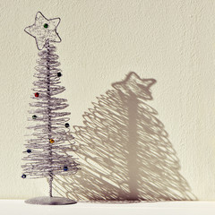 Wall Mural - christmas tree against a white wall