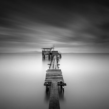 Fine Art Image Of Wooden Fishing Jetty At Beach In Black And White.Long Exposure Shot With Motion Blur.