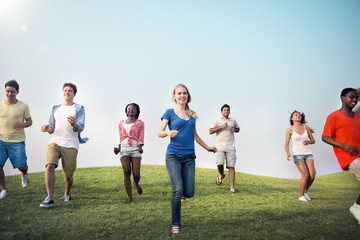 Canvas Print - Group Casual People Running Outdoors Concept
