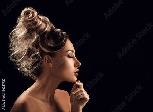 Fotografie, Obraz Portrait of Beautiful Young Woman with hairstyle touching her fa