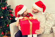 © Syda Productions - smiling father and daughter opening gift box