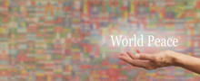 Words Of Peace - Female Hand Outstretched With The Words WORLD PEACE Floating Above, On A Wide Multicolored Rustic Stone Effect Background Made Up Of Softly Faded National Flags