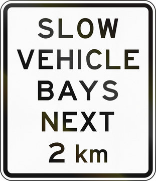 New Zealand road sign - Slow vehicle bays for the next 2 kilometres
