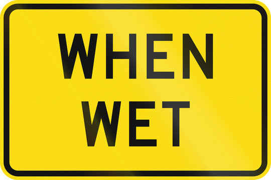 New Zealand road sign - Road surface slippery when wet
