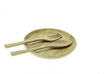 Empty flat wooden dish, fork and spoon isolated on white backgro