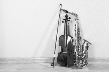 Sticker - Black-and-white photo of violin and saxophone