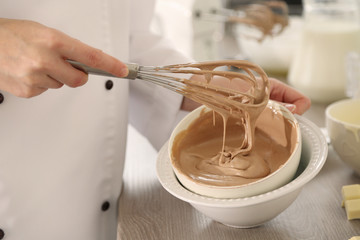 Canvas Print - Cooking chocolate cream on kitchen