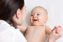 Happy Infant Baby Looking At Mom