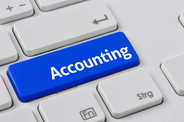 Wall Mural - a keyboard with a blue button - accounting