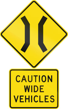 Road sign assembly in New Zealand - Caution wide vehicles