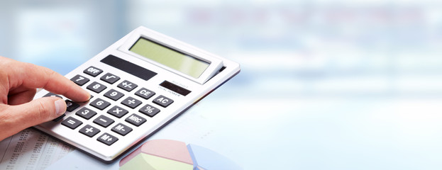 Aufkleber - Hand with a calculator.