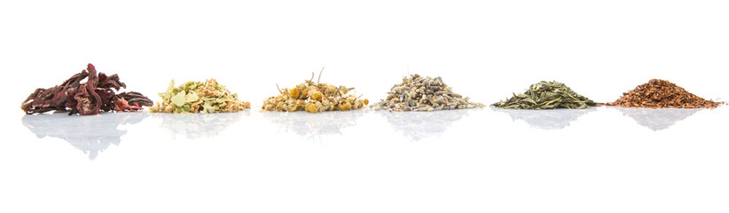 Dried herbal tea leaves, lavender, rooibos, chamomile, linden flower, hibiscus, Japanese green tea over white background