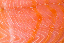 Macro Of Some Slices Of Smoked Salmon. Perfect As Organic Background.