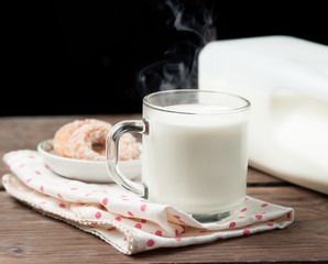 Sticker - Glass of milk with doughnut on wood