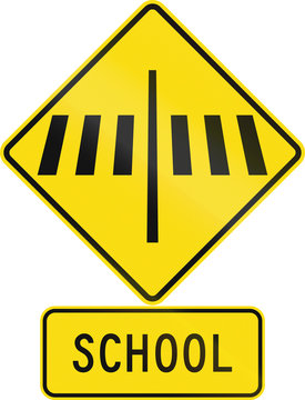 Road sign assembly in New Zealand - Zebra crossing at school