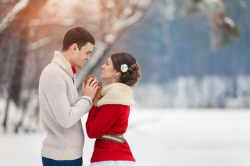 bride and groom in winter forest