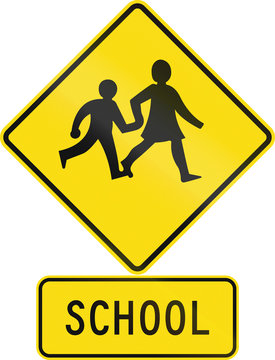 Road sign assembly in New Zealand - School