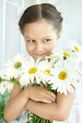 Wall Mural - little girl with dasies flowers