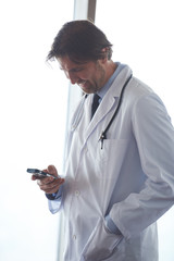 Wall Mural - doctor speaking on cellphone