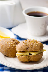 Wall Mural - rye buns with cheese for a breakfast