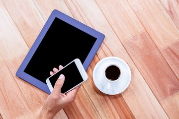 Poster - Businesswoman using her smartphone on desk