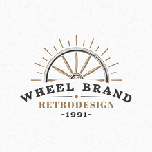 Wooden Wheel. Vintage Retro Design Elements For Logotype, Insignia, Badge, Label. Business Sign Template. Textured Background