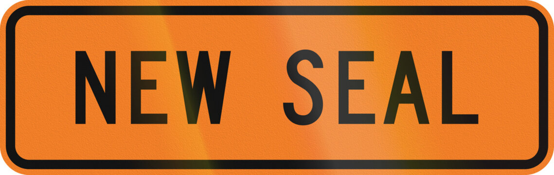 New Zealand road sign - New seal being applied to road