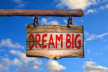 Dream big motivational phrase sign