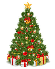 fluffy christmas tree decorated by christmas balls, jingle bells and candy cane. gift boxes are unde