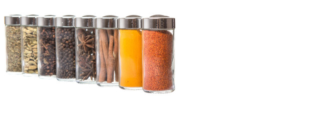 Wall Mural - Variety of spices over white background