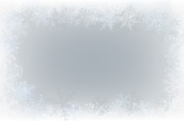 Border of various snowflakes on light grey background.