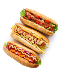 Poster - Three fresh hot dogs isolated on white