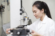 © tatomm - Woman engineer setup testing machine