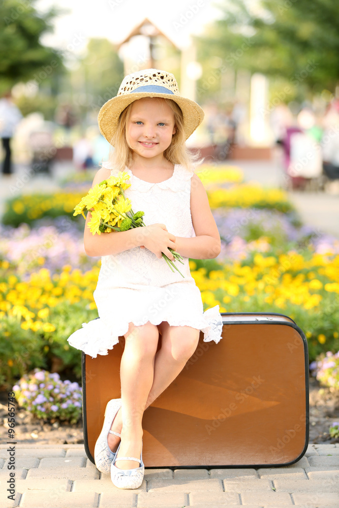 Happy girl walking in park