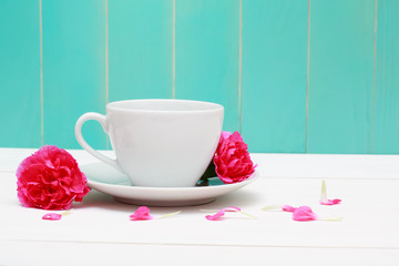 Wall Mural - Coffee cup with pink carnations