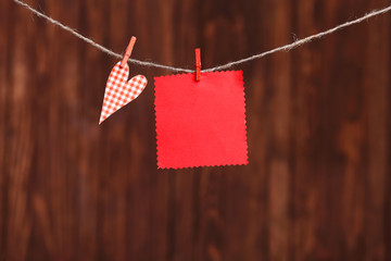 Wall Mural - Red heart and blank note, on wooden background