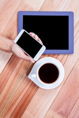 Poster - Businesswoman using her smartphone on desk