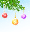 Christmas balls on christmas tree branch