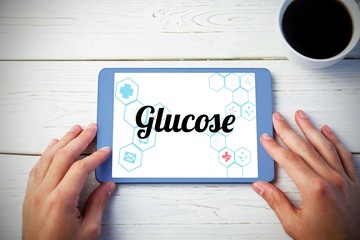 Poster - Glucose against person using tablet computer
