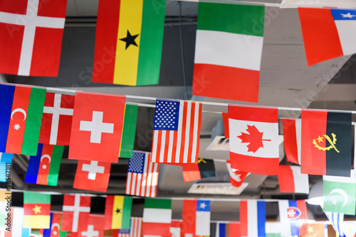 Many Countries Flags Hanging From A Ceiling On Ropes Buy