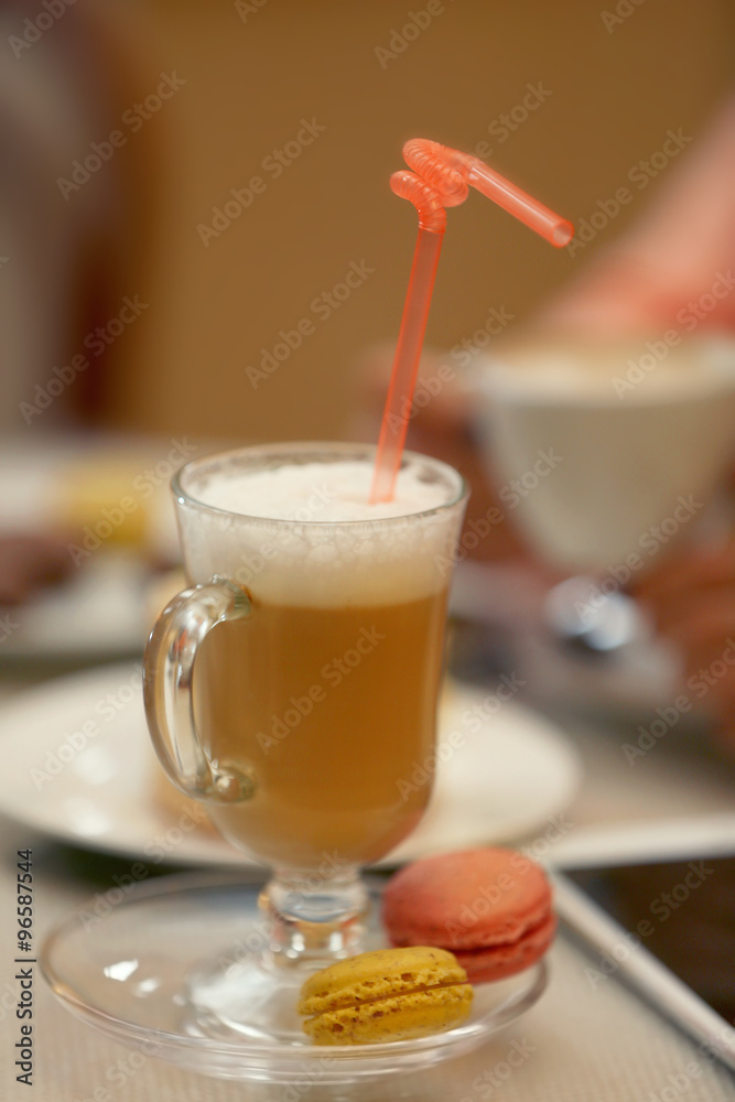 Cup of latte on a table closeup
